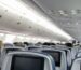 Sleeping upright on a plane without wrecking your neck